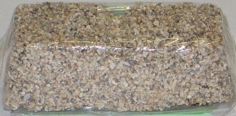 NatMin - ehemals Merkels Mineralmenü  Mineralstein für Wellensittiche mit Aluhalter 65g